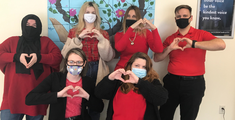 Utica Academy of Science high school faculty and staff participated in the national Go Red for Women campaign.