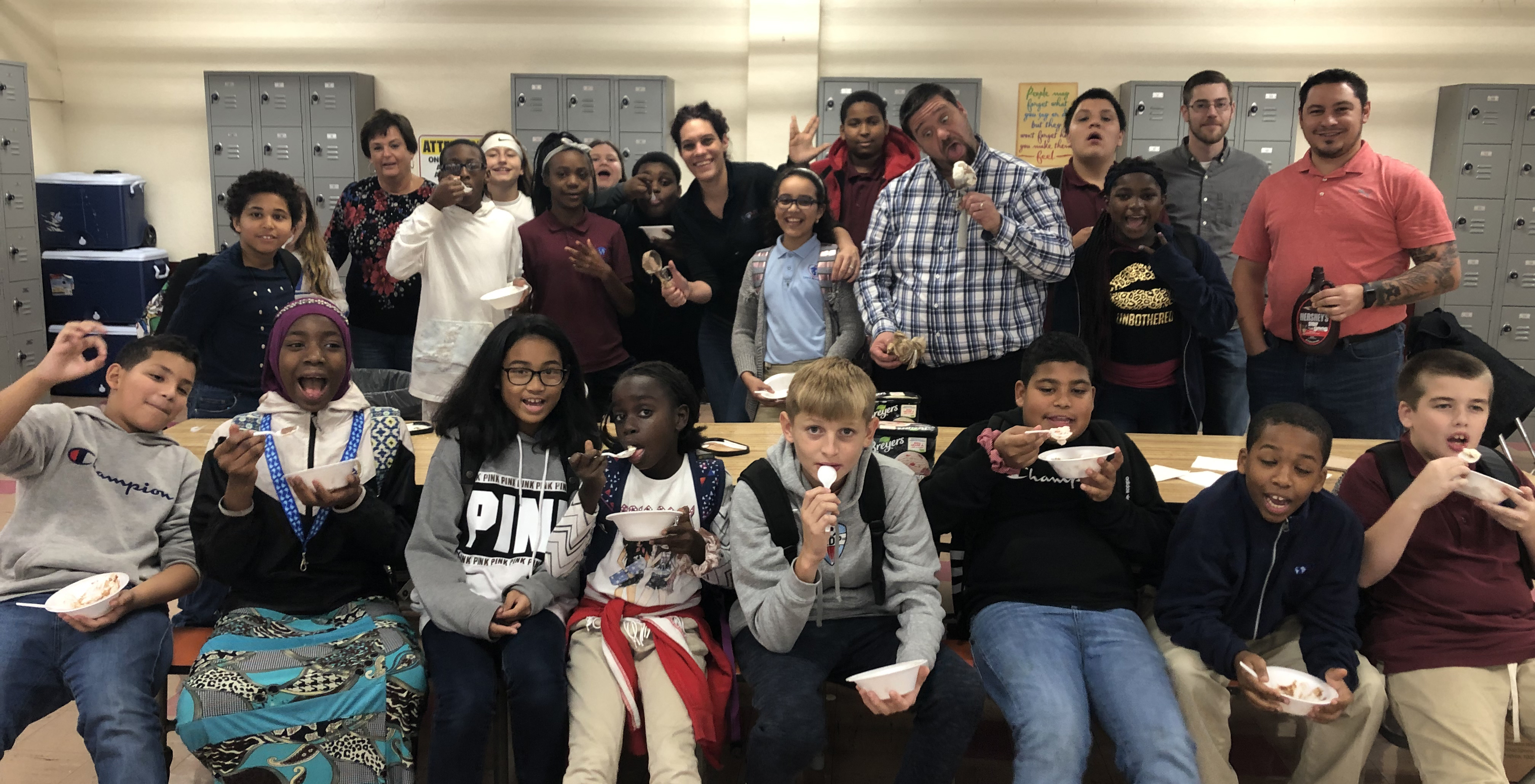 Middle school Atoms enjoy an ice cream social for receiving 25 merits