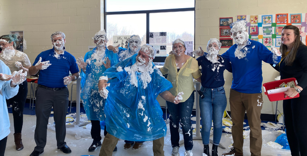 To celebrate Pi Day, the Utica Academy of Science junior-senior high school Atoms hosted a Pie in the Face event to benefit and support the people in Ukraine.