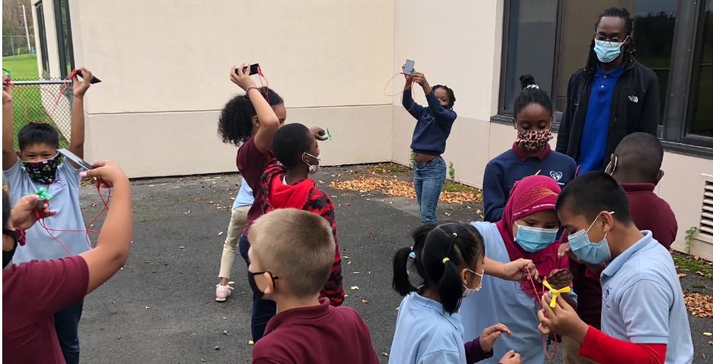 Utica Academy of Science 4th grade students let the sun do the work, when testing out their solar powered electrical systems.