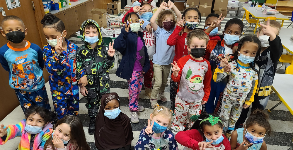 Utica Academy of Science elementary school students dress in pajamas for their Polar Express themed holiday celebration before Winter Recess.