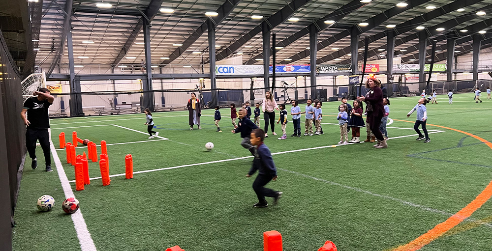 Utica Academy of Science Kindergarteners Learn about Athletics at Accelerate Sports Complex
