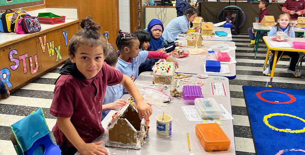Utica Academy of Science Atoms in Ms. Woodruff’s class Decorate Gingerbread Houses